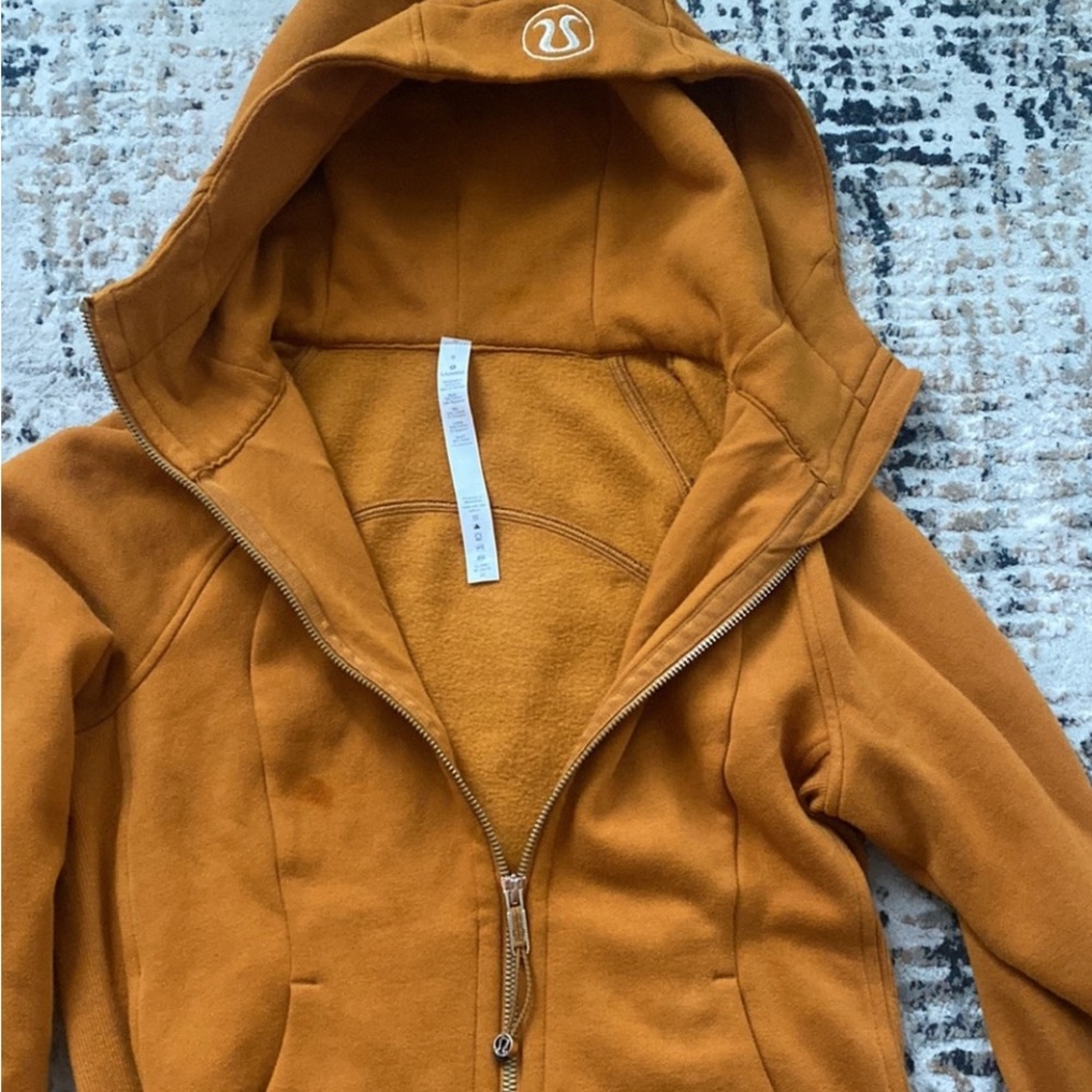 LULU LEMON- orange great for fall sweater size 6